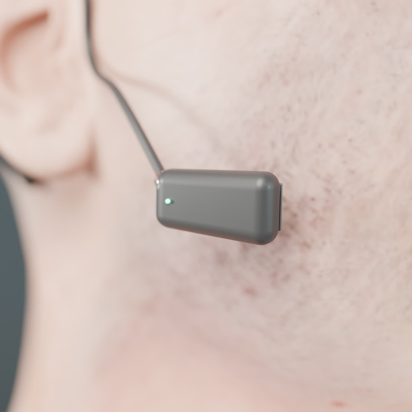 Concept render: the ear-worn unit, a small pod resting near the cheek